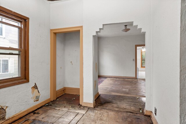 693 Bedford St, Saint Paul, MN 55130 - unfurnished room with healthy amount of natural light and hardwood / wood-style flooring
