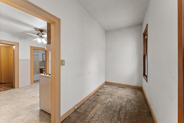 693 Bedford St, Saint Paul, MN 55130 - empty room with ceiling fan, washer / clothes dryer, and wood finished floors