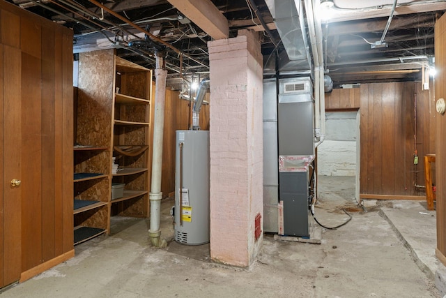 693 Bedford St, Saint Paul, MN 55130 - unfinished basement with water heater and heating unit