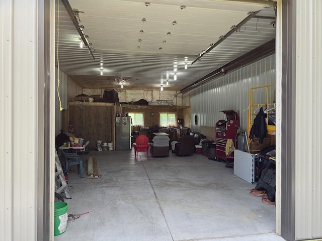 20389 640th Ln, Jacobson, MN 55752 - garage with freestanding refrigerator