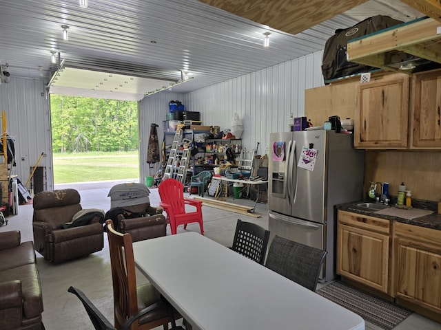 20389 640th Ln, Jacobson, MN 55752 - garage with stainless steel fridge and a sink