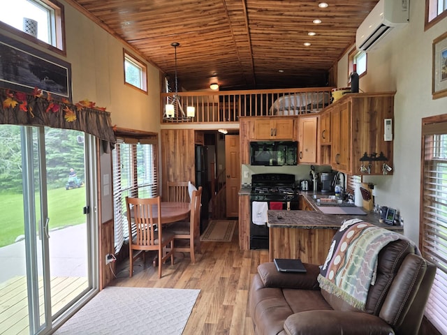 20389 640th Ln, Jacobson, MN 55752 - kitchen featuring black appliances, wooden ceiling, a wall mounted AC, light wood-type flooring, and dark countertops