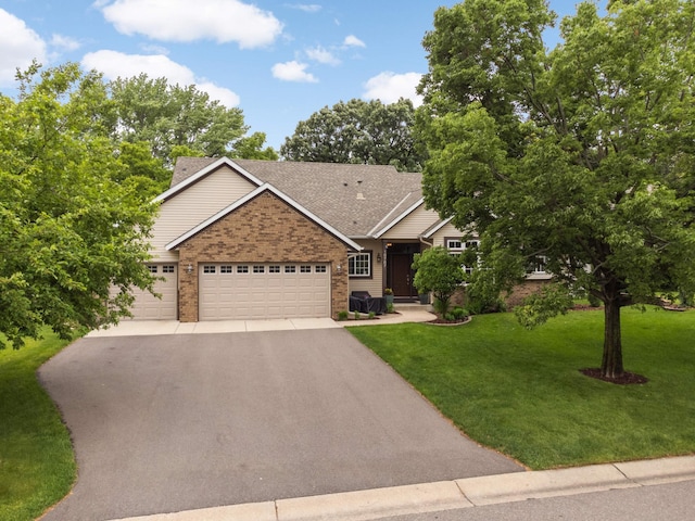 10787 Alison Way, Inver Grove Heights, MN 55077 - view of front of property with brick siding, driveway, a front lawn, and an attached garage