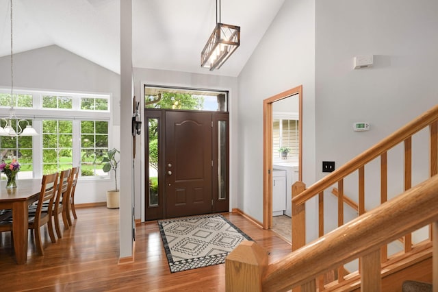 10787 Alison Way, Inver Grove Heights, MN 55077 - entrance foyer featuring wood finished floors, high vaulted ceiling, and stairway
