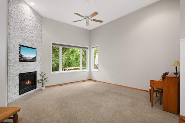 10787 Alison Way, Inver Grove Heights, MN 55077 - unfurnished living room with carpet floors, a ceiling fan, and a fireplace