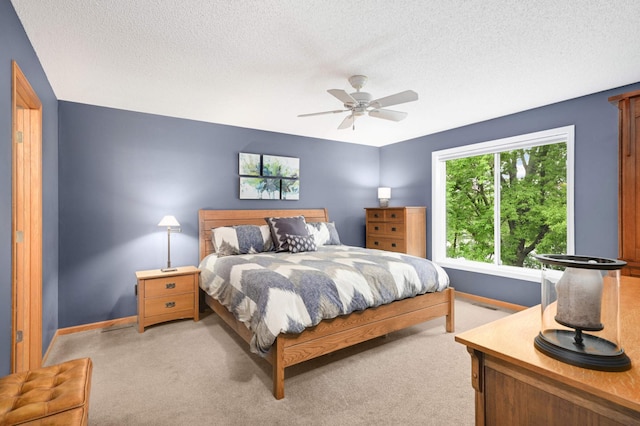 10787 Alison Way, Inver Grove Heights, MN 55077 - bedroom featuring light carpet, a textured ceiling, and ceiling fan