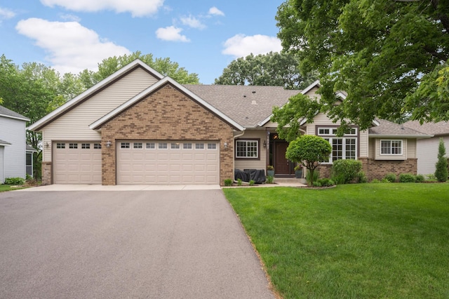 10787 Alison Way, Inver Grove Heights, MN 55077 - ranch-style house featuring brick siding, driveway, a garage, and a front yard