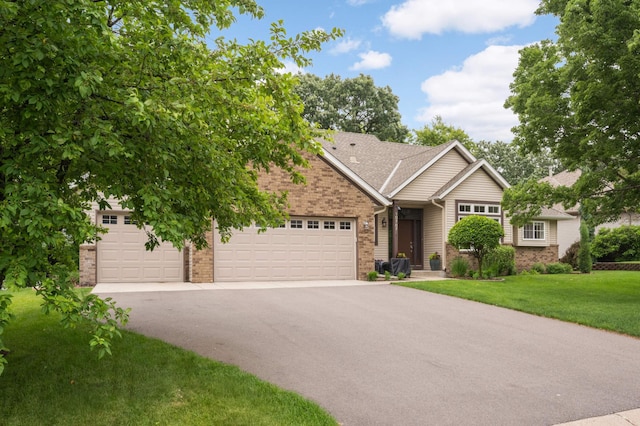 10787 Alison Way, Inver Grove Heights, MN 55077 - view of front of house with brick siding, an attached garage, asphalt driveway, a front yard, and roof with shingles