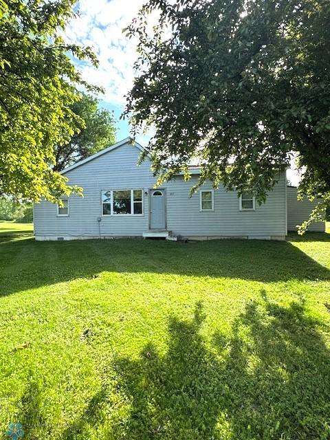 857 Main St, Mahnomen, MN 56557 - back of house with a yard