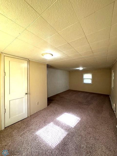 857 Main St, Mahnomen, MN 56557 - basement featuring carpet