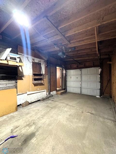 857 Main St, Mahnomen, MN 56557 - garage featuring a garage door opener