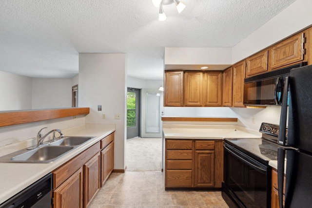 1369 Spencer Rd W, Saint Paul, MN 55108 - kitchen with black appliances, brown cabinets, a textured ceiling, and light countertops