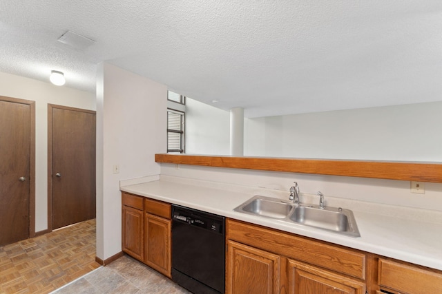 1369 Spencer Rd W, Saint Paul, MN 55108 - kitchen featuring black dishwasher, a textured ceiling, light countertops, and brown cabinets