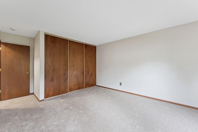 1369 Spencer Rd W, Saint Paul, MN 55108 - unfurnished bedroom featuring carpet and a closet
