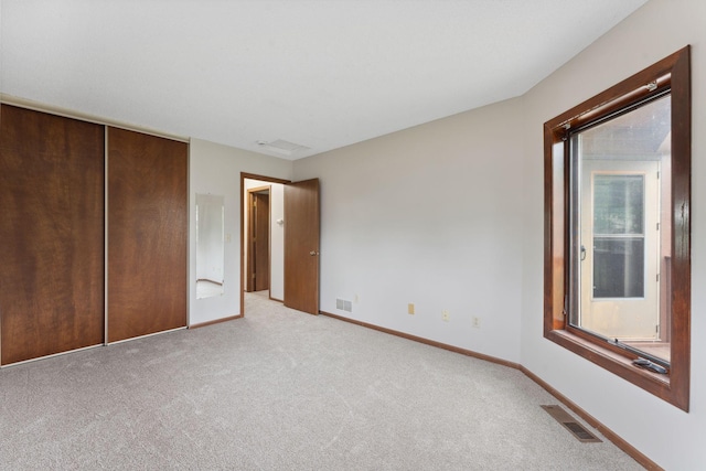 1369 Spencer Rd W, Saint Paul, MN 55108 - unfurnished bedroom with carpet floors and a closet