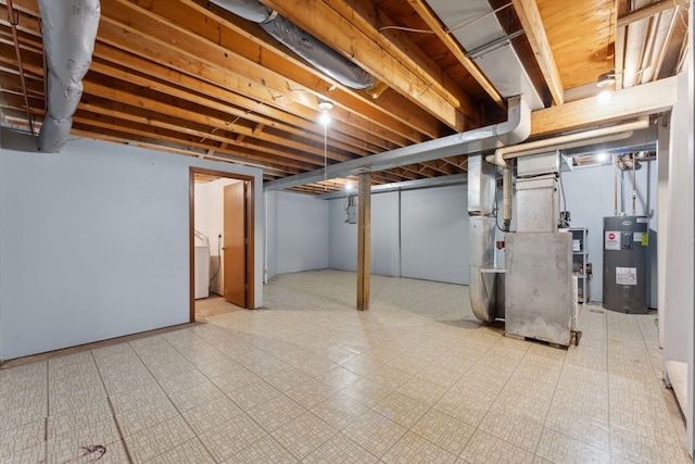 1369 Spencer Rd W, Saint Paul, MN 55108 - finished below grade area featuring water heater, heating unit, and tile patterned floors