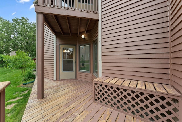 1369 Spencer Rd W, Saint Paul, MN 55108 - wooden deck featuring a lawn