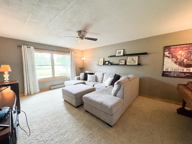 906 Whitford St, Fergus Falls, MN 56537 - carpeted living area with a baseboard radiator, a ceiling fan, and a textured ceiling