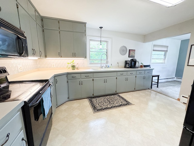 906 Whitford St, Fergus Falls, MN 56537 - kitchen featuring black appliances, light flooring, gray cabinetry, and healthy amount of natural light