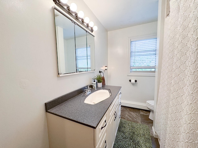 906 Whitford St, Fergus Falls, MN 56537 - full bathroom with vanity, baseboard heating, and tile patterned floors