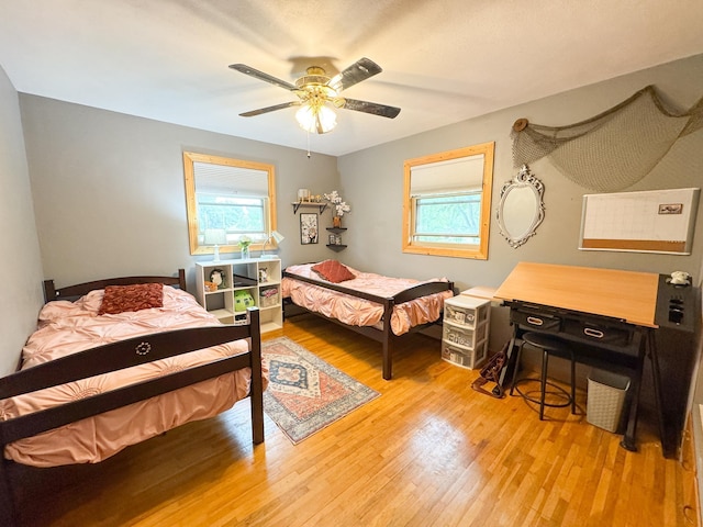 906 Whitford St, Fergus Falls, MN 56537 - bedroom featuring light wood finished floors and ceiling fan