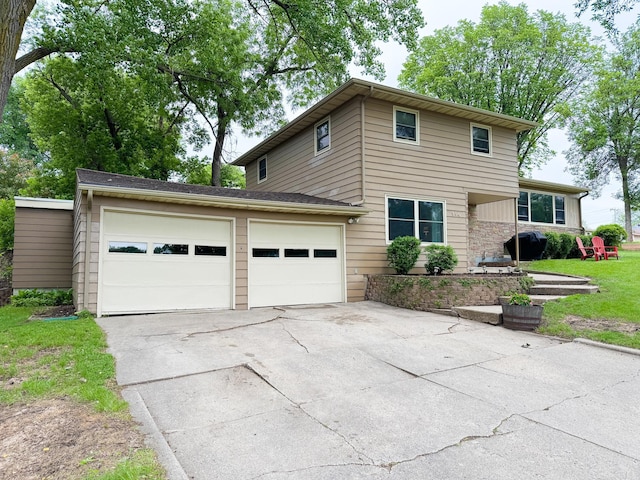 906 Whitford St, Fergus Falls, MN 56537 - view of front of property with driveway and a garage