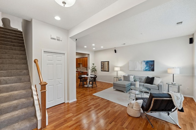 5900 Oxford St Unit 8, Saint Louis Park, MN 55416 - living room featuring light wood-type flooring, stairs, and recessed lighting
