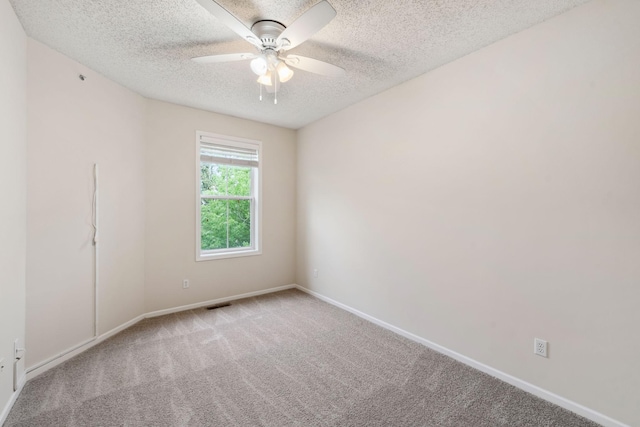 5900 Oxford St Unit 8, Saint Louis Park, MN 55416 - unfurnished room with a textured ceiling, carpet flooring, and a ceiling fan