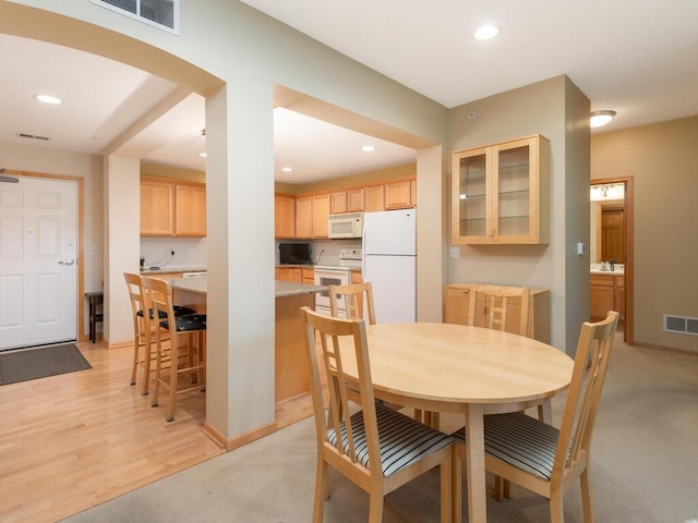 8292 Labont Way Unit 210, Eden Prairie, MN 55344 - dining area featuring recessed lighting and light colored carpet