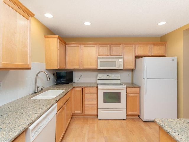 8292 Labont Way Unit 210, Eden Prairie, MN 55344 - kitchen with white appliances, light brown cabinetry, light wood-style flooring, light stone counters, and recessed lighting