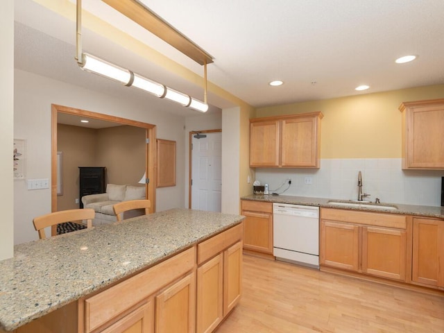 8292 Labont Way Unit 210, Eden Prairie, MN 55344 - kitchen with white dishwasher, light brown cabinetry, light wood finished floors, tasteful backsplash, and recessed lighting