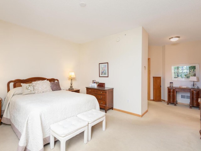 8292 Labont Way Unit 210, Eden Prairie, MN 55344 - bedroom with baseboards and light carpet