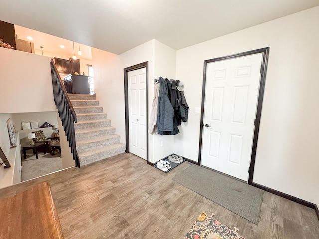 4551 15th St S, Moorhead, MN 56560 - foyer with light wood finished floors and stairs