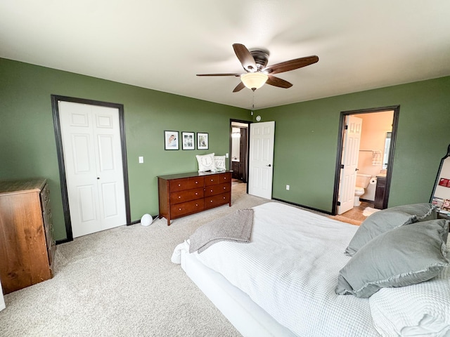 4551 15th St S, Moorhead, MN 56560 - bedroom featuring light carpet, a ceiling fan, and connected bathroom