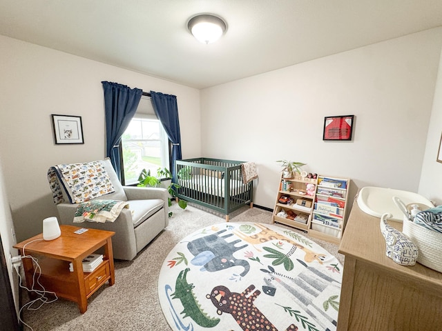 4551 15th St S, Moorhead, MN 56560 - bedroom featuring carpet floors and a nursery area
