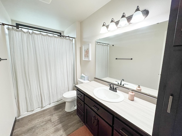 4551 15th St S, Moorhead, MN 56560 - full bathroom featuring vanity and wood finished floors