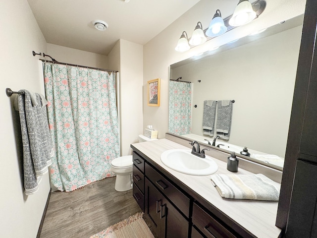 4551 15th St S, Moorhead, MN 56560 - bathroom featuring vanity, wood finished floors, and a shower with shower curtain