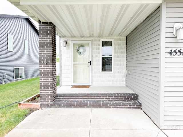 4551 15th St S, Moorhead, MN 56560 - entrance to property with a lawn