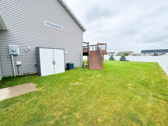 4551 15th St S, Moorhead, MN 56560 - fenced backyard with stairs and a wooden deck