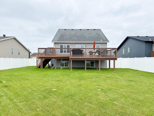 4551 15th St S, Moorhead, MN 56560 - rear view of house featuring a wooden deck, a fenced backyard, a shingled roof, and stairway