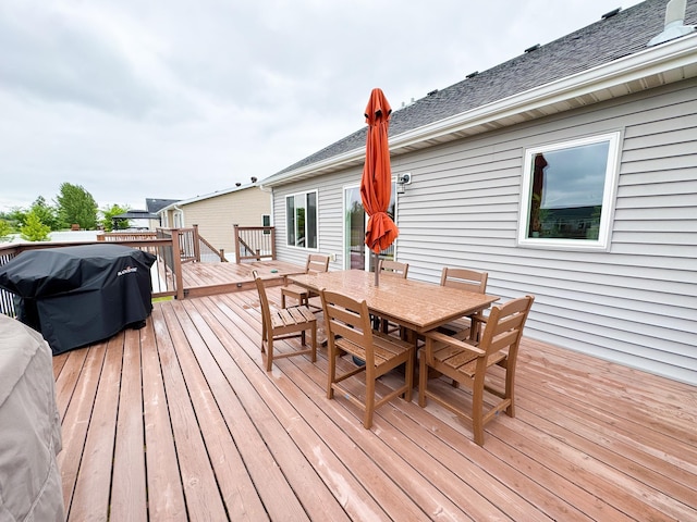 4551 15th St S, Moorhead, MN 56560 - deck featuring outdoor dining area and grilling area