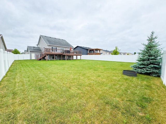 4551 15th St S, Moorhead, MN 56560 - back of house featuring a deck, a fenced backyard, and stairway