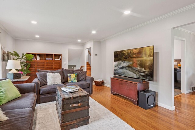 4428 Marlborough Ct, Minnetonka, MN 55345 - living area with wood finished floors, stairs, crown molding, and recessed lighting