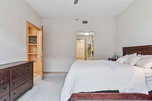 215 10th Ave S Unit 533, Minneapolis, MN 55415 - bedroom featuring light colored carpet and a ceiling fan