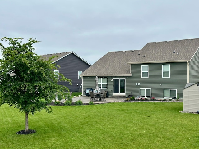 7559 Oday Ln NE, Otsego, MN 55330 - rear view of property with a patio, a lawn, and roof with shingles