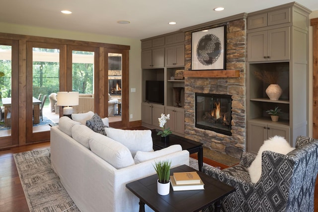 6445 County Road 26, Minnetrista, MN 55364 - living room featuring a fireplace, french doors, wood finished floors, recessed lighting, and built in features