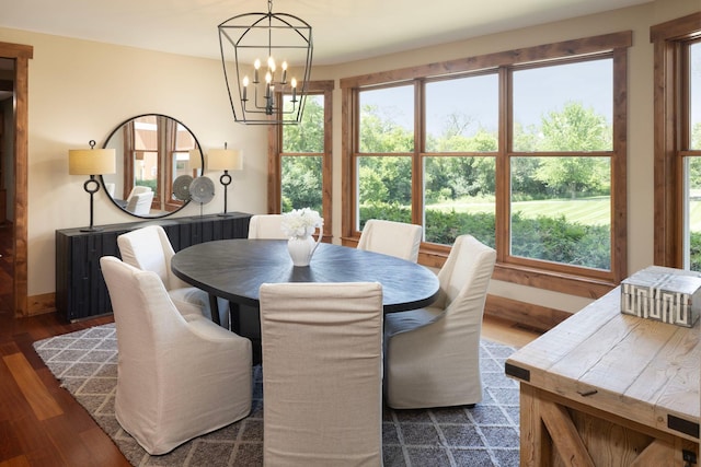 6445 County Road 26, Minnetrista, MN 55364 - dining area with a chandelier and dark wood-type flooring