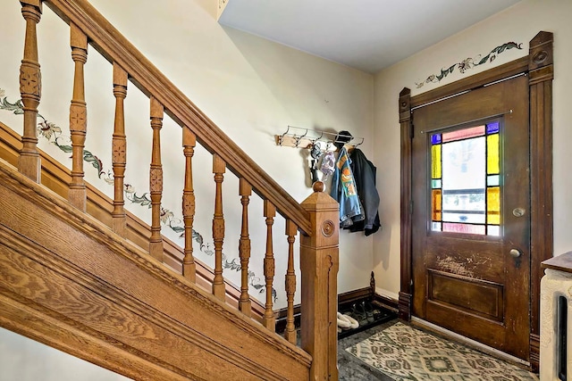 531 2nd St N, Brownton, MN 55312 - foyer entrance featuring stairs and baseboards