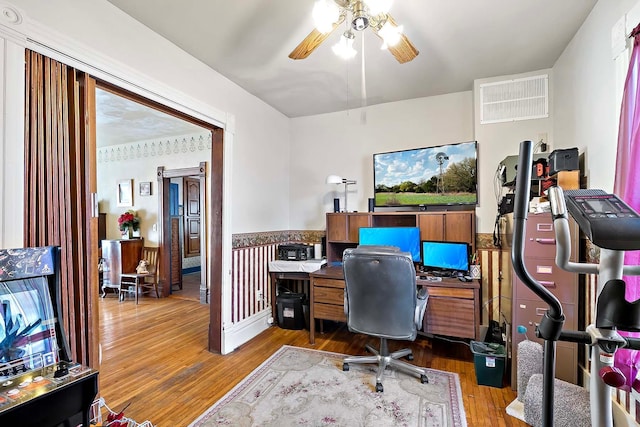 531 2nd St N, Brownton, MN 55312 - office area featuring wood finished floors, ceiling fan, and wainscoting
