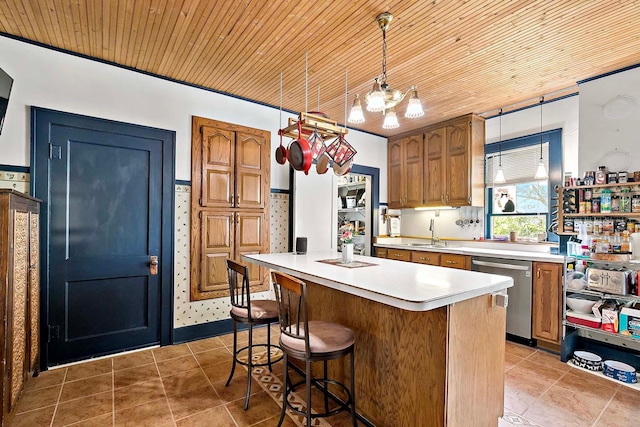 531 2nd St N, Brownton, MN 55312 - kitchen with stainless steel dishwasher, tile patterned floors, light countertops, wood ceiling, and decorative light fixtures